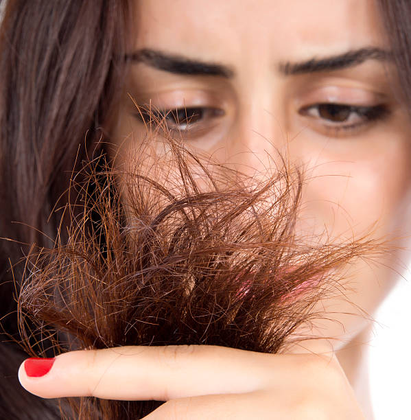 women worried about her damaged hair